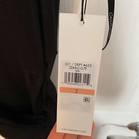 Beautiful black Calvin Klein midi dress. Wrap around - Picture 3 of 4